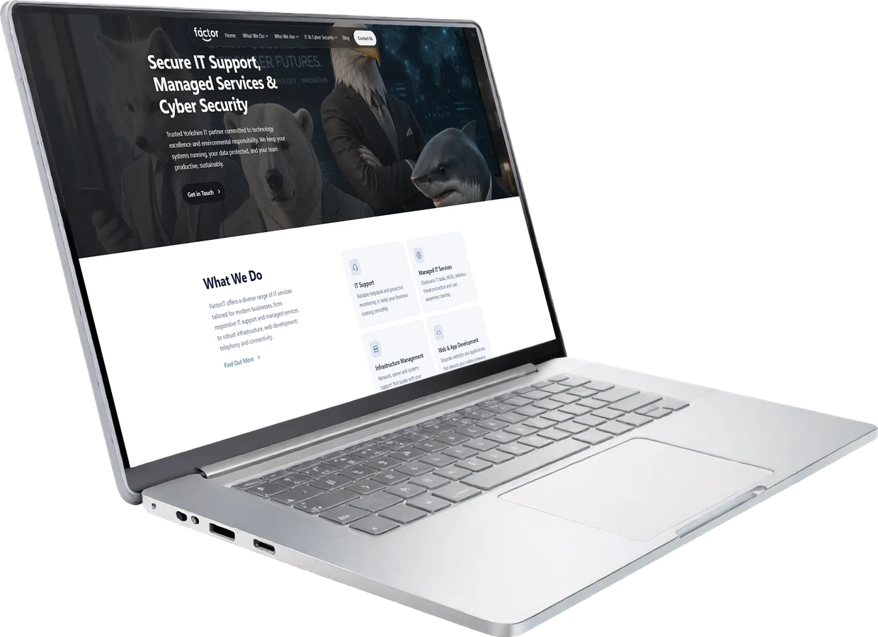 The FactorIT website shown on a laptop